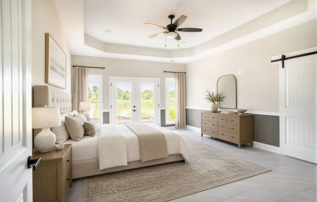 Bedroom with a large bed featuring white bedding and pillows, a dresser with a bowl on top, a ceiling fan with a light, and a painting visible on the wall.