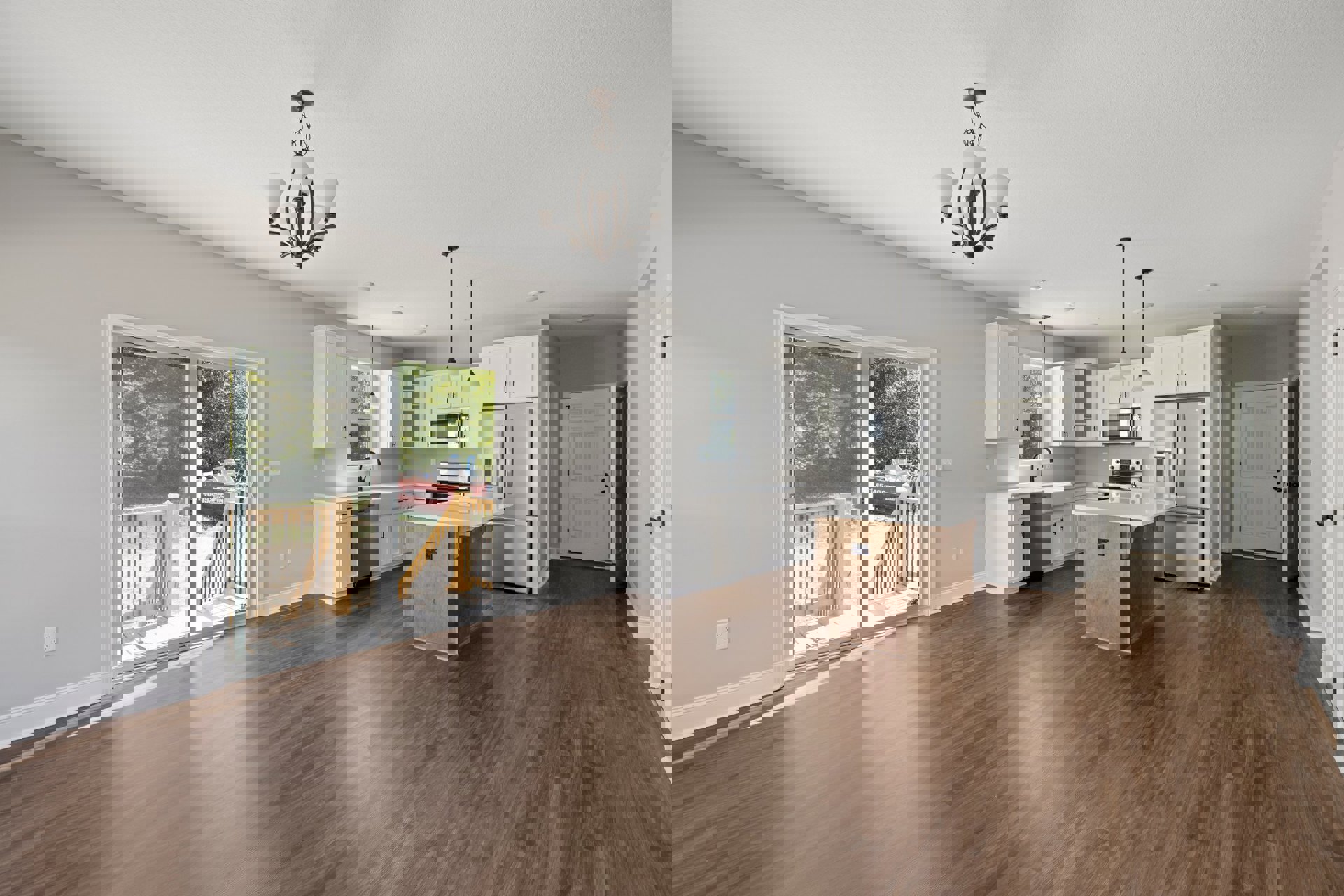 Open kitchen and dining area featuring wood flooring, white cabinetry, stainless steel appliances including a glass-door microwave and silver-handled refrigerator, sliding glass