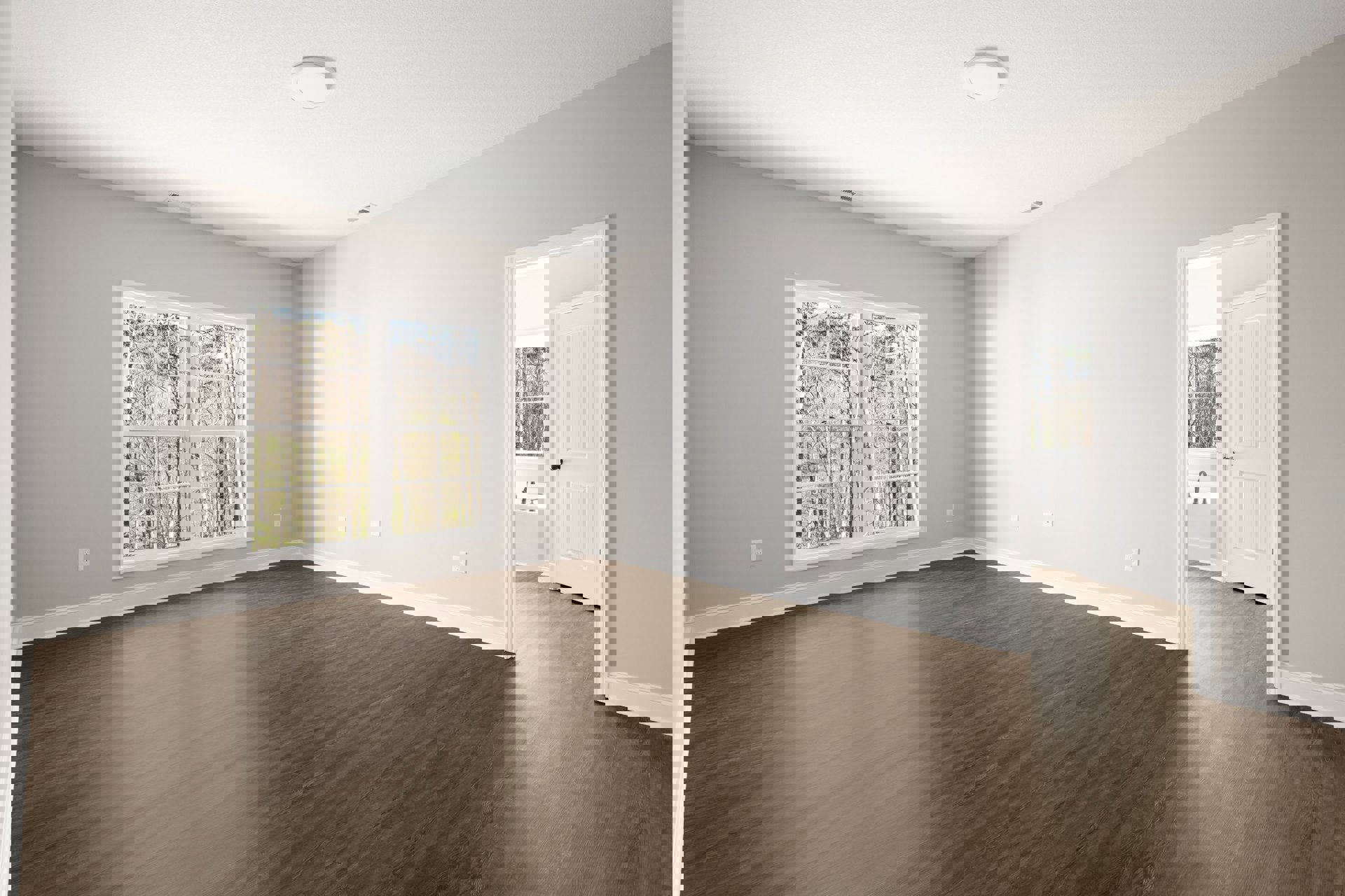 Spacious room with light wood flooring, large windows overlooking trees, white walls, white ceiling with round light fixture, and white door with black knob