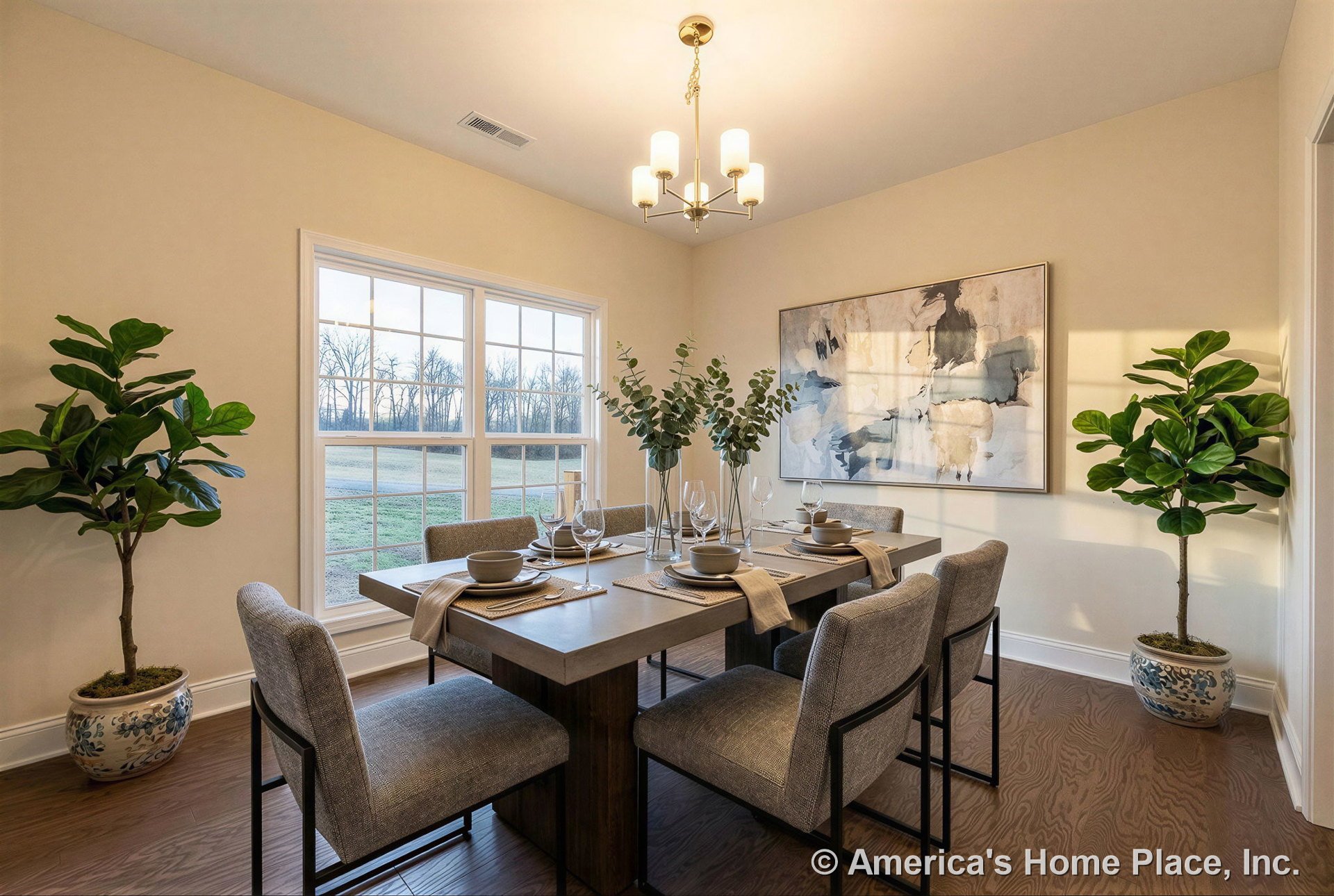 Dining room with double grid-pattern windows, wood plank flooring, modern chandelier, neutral wall paint, wide baseboard trim, and rectangular layout.