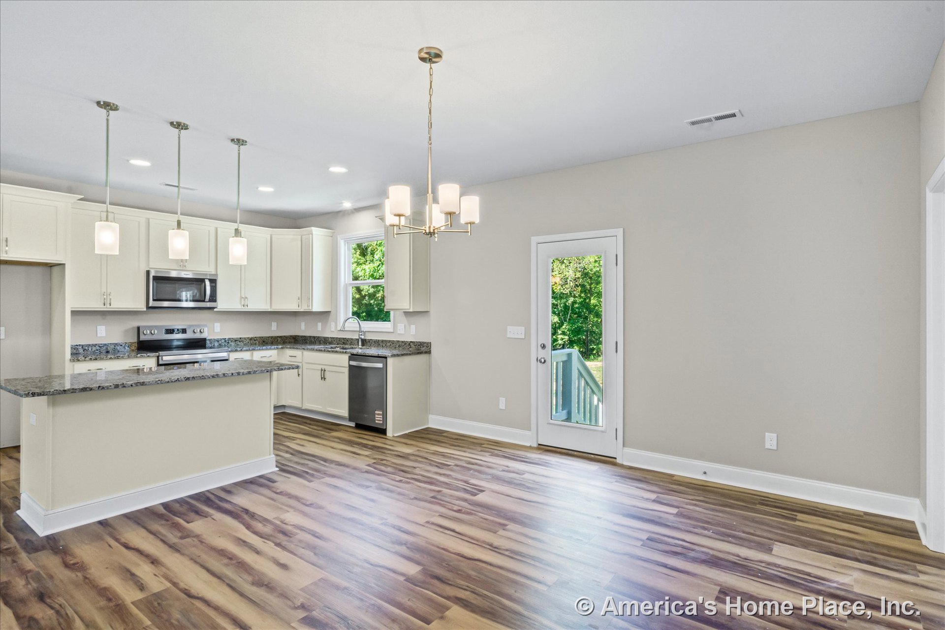 Open kitchen and dining area with white shaker cabinets, granite countertops, stainless steel appliances, pendant and chandelier lighting, wood-look plank flooring, single glass