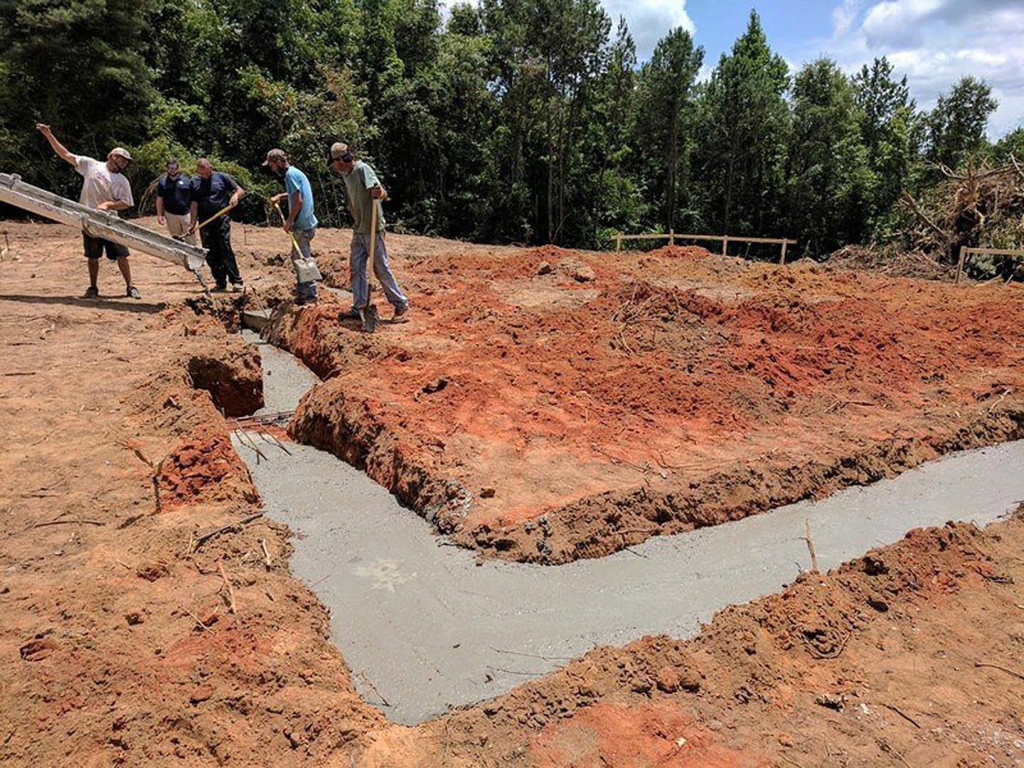 A group of men working on a construction site.