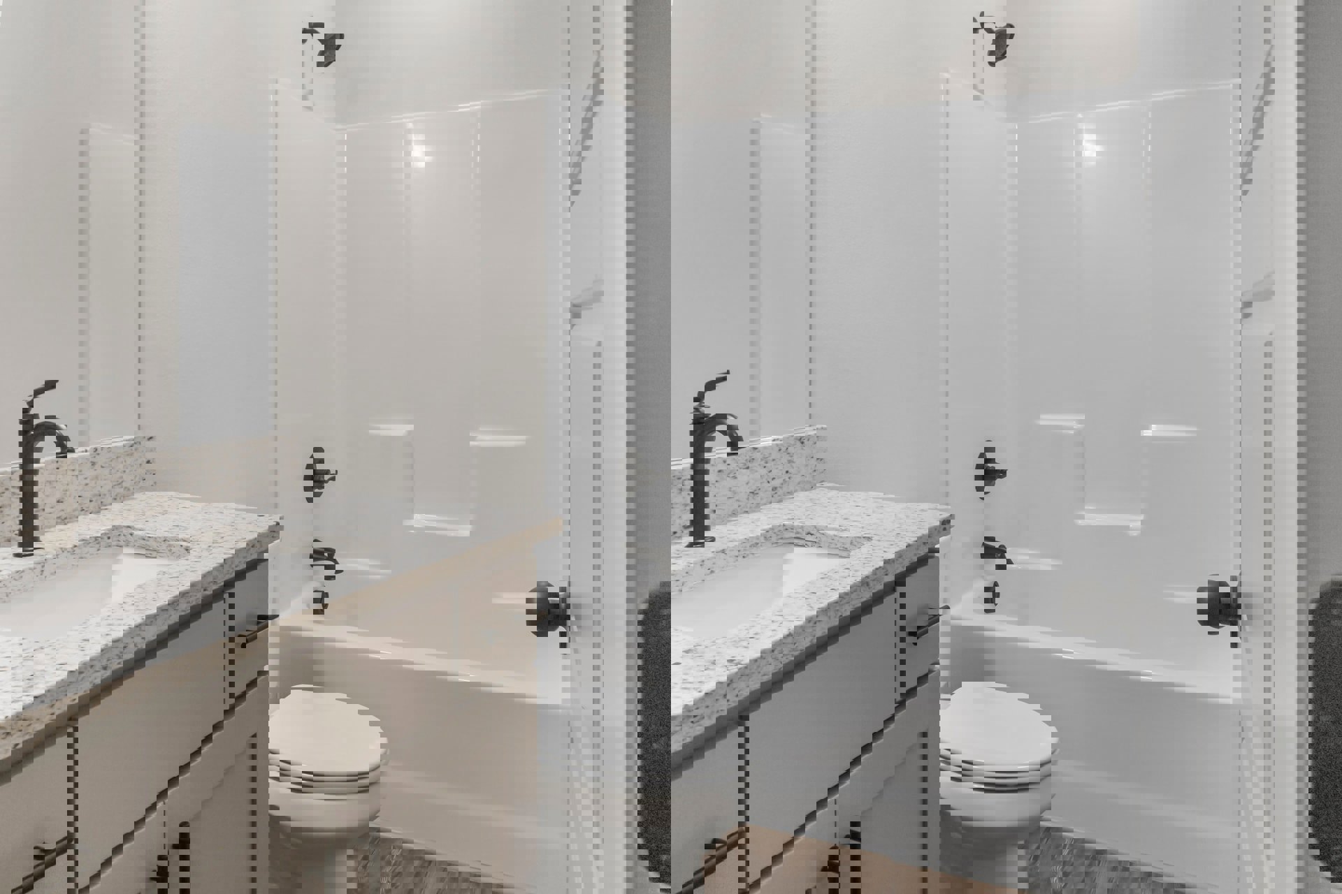 Modern bathroom with white toilet, rectangular sink featuring a matte black faucet, wall-mounted shower head, light-colored tile walls, and partial view of a mirror.