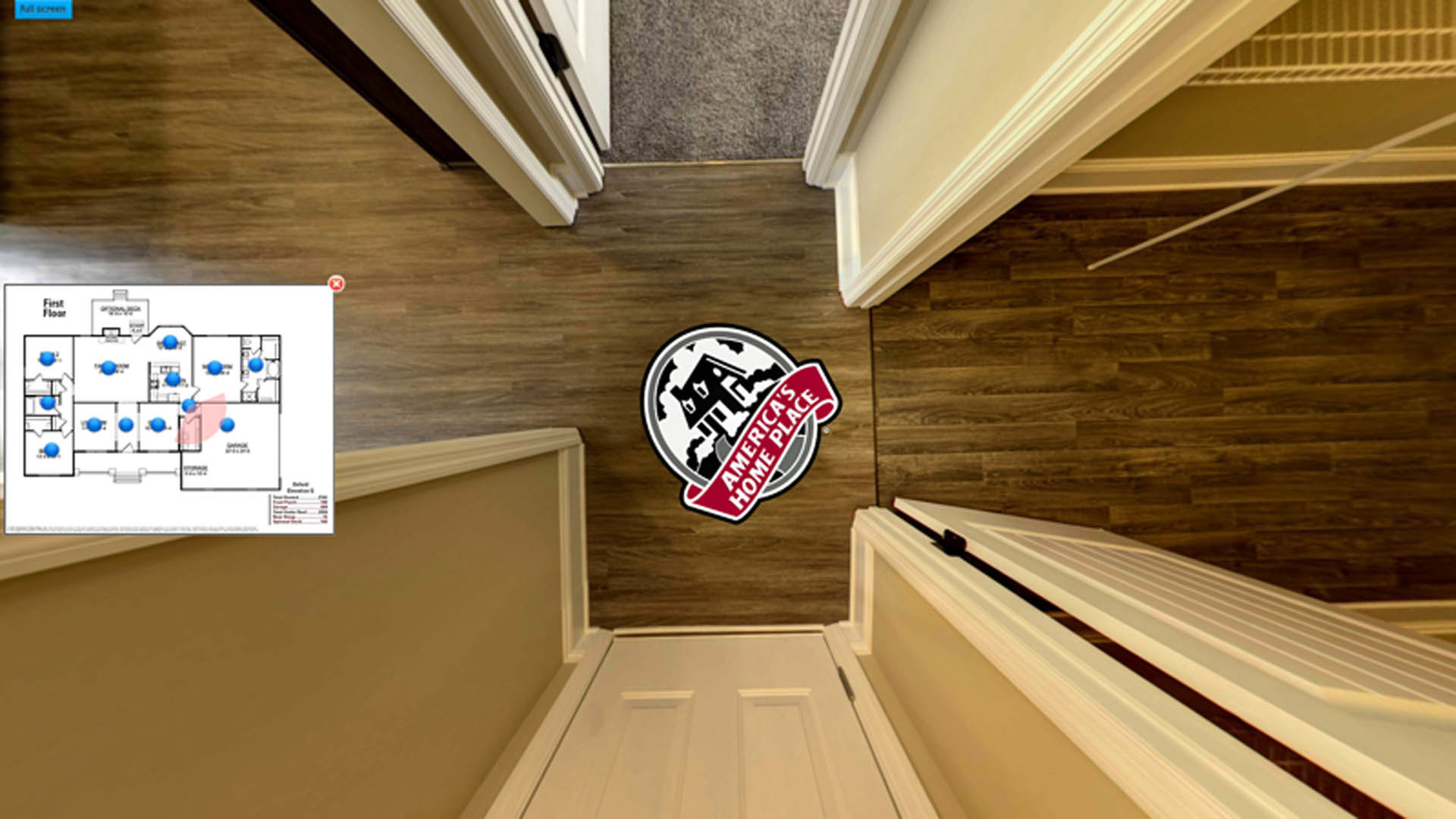 White door set in a brown wall, floor displaying a house blueprint and logo sign, ceiling and interior design elements visible.