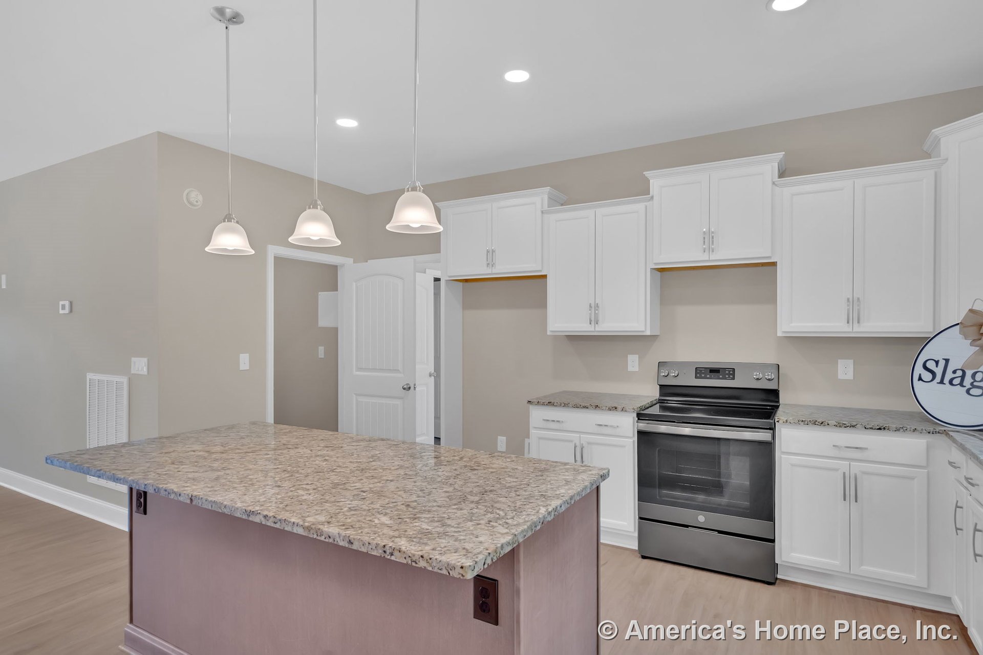 Granite island countertop with white upper and lower cabinetry, stainless steel electric range, pendant lighting fixtures, recessed ceiling lights, and wood-look flooring.