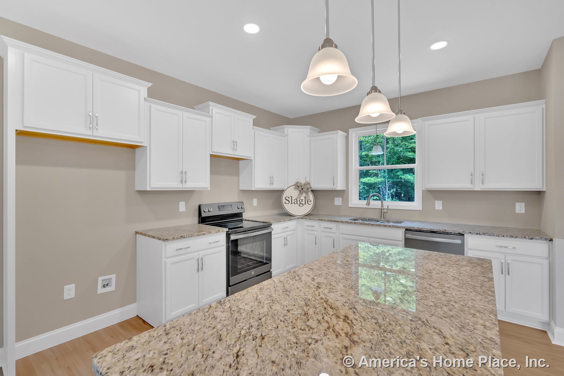 White cabinetry and granite countertops with a central island featuring pendant lighting, stainless steel electric range, undermount sink beneath a double window, dishwasher, and