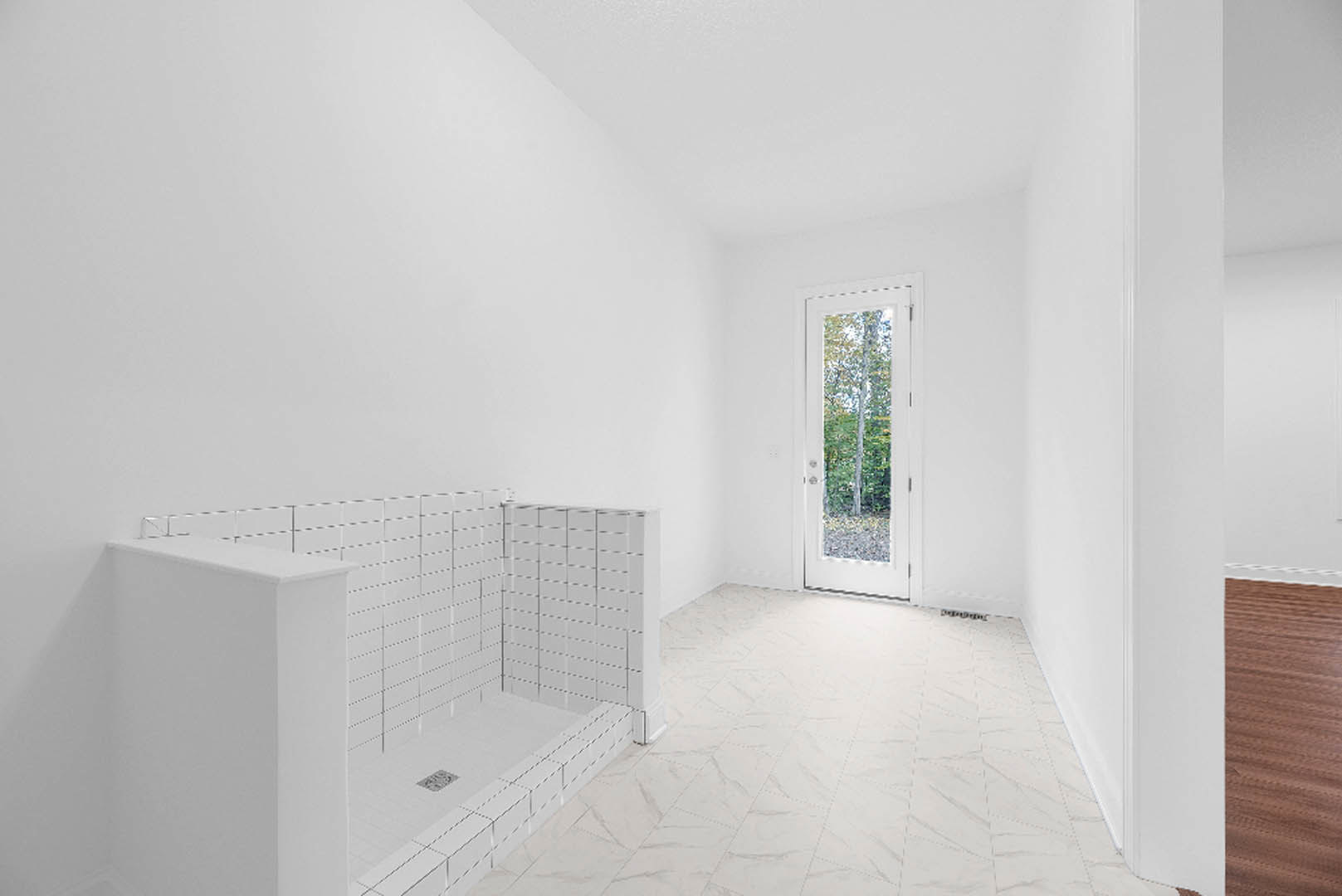 White bathroom with a glass shower enclosure, white tile floor, white walls, and a white door with a window.