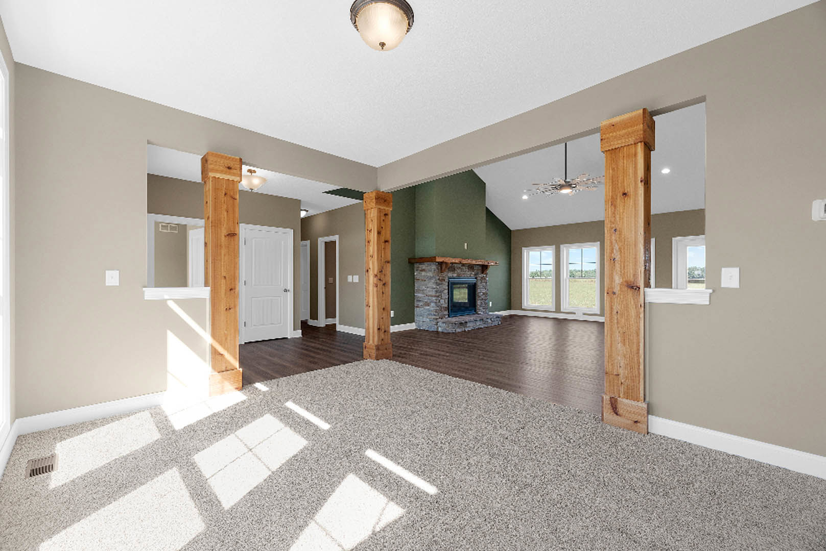 Living room with beige carpet, white walls, brick fireplace featuring a wooden mantel, two large windows, white door with silver handles, recessed ceiling light