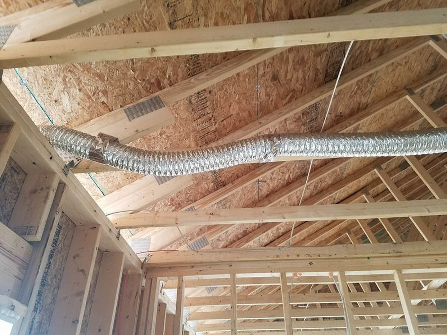 A metal hose in a house.