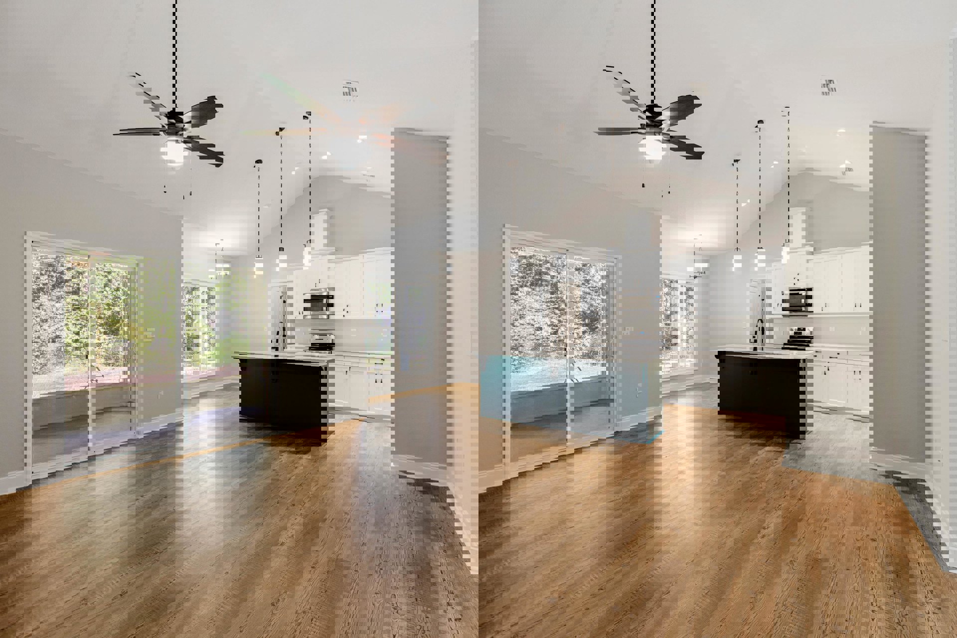 Open kitchen and dining area featuring wood flooring, dark green accent wall, ceiling fan with light, kitchen counter with built-in sink, and stainless steel microwave.