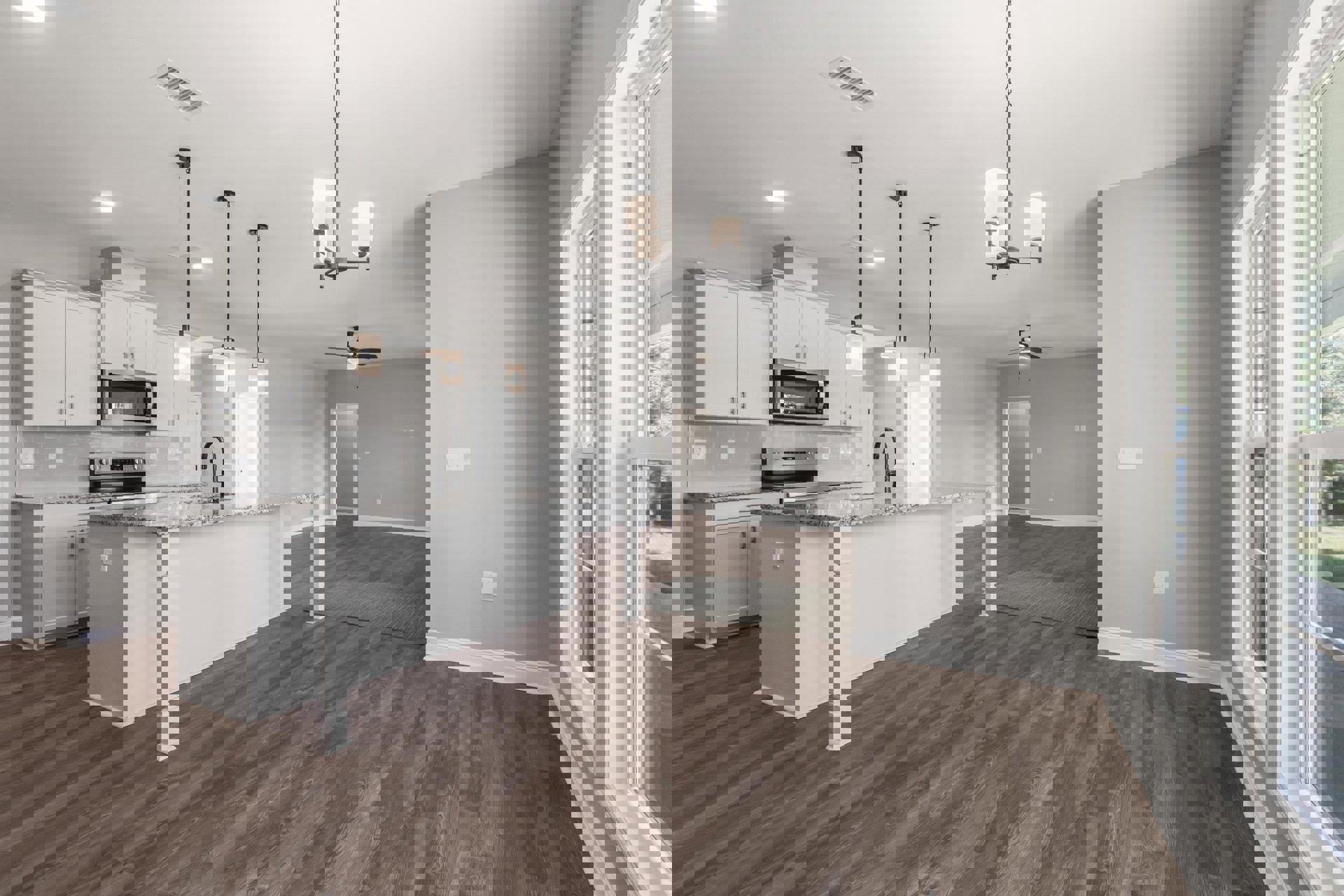 Open kitchen and dining area with hardwood flooring, white cabinetry, stainless steel microwave, pendant light with white shade, wood floor extending to white column, light-colored