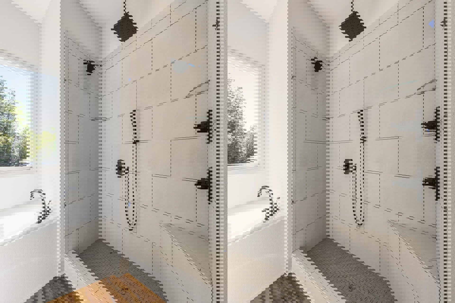 Modern bathroom with white tile walls, black square shower head, black faucet, built-in bathtub, and window overlooking trees