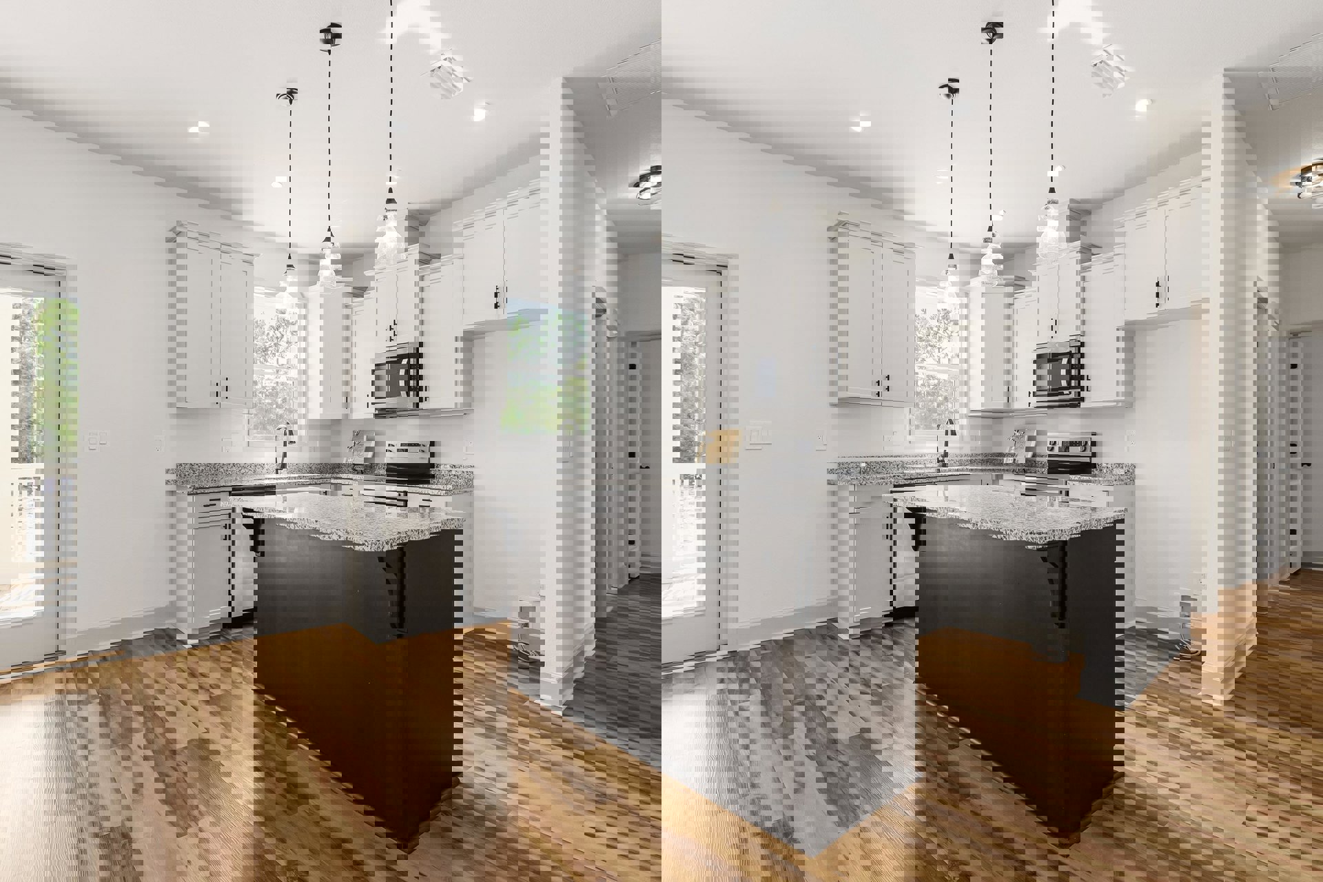 Kitchen featuring a black island with marble countertop, white cabinets, stainless steel microwave, farmhouse sink, light wood flooring, and decorative wooden board with ribbon.