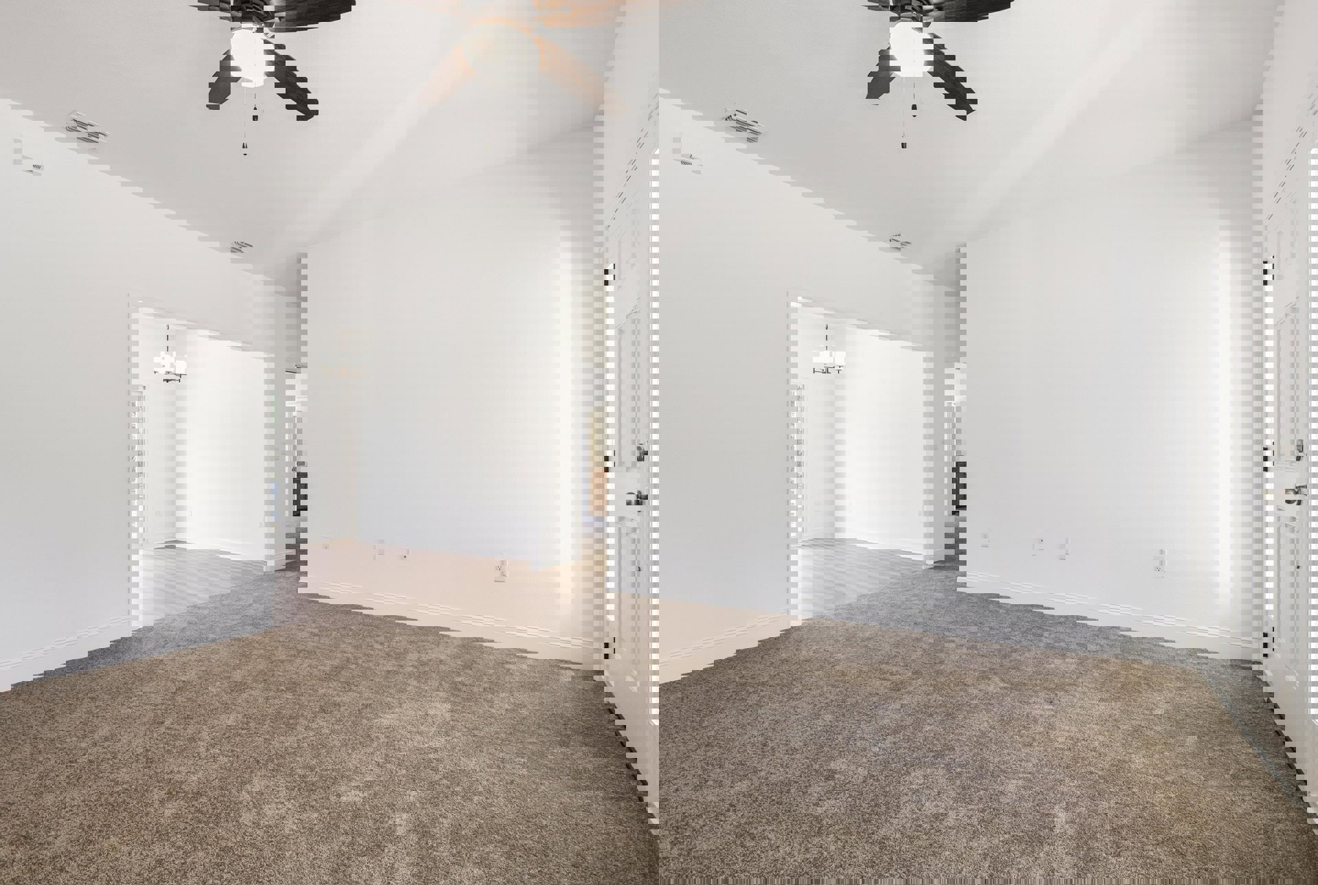 Carpeted room with white walls, ceiling fan with light fixture, white door, and textured plaster ceiling