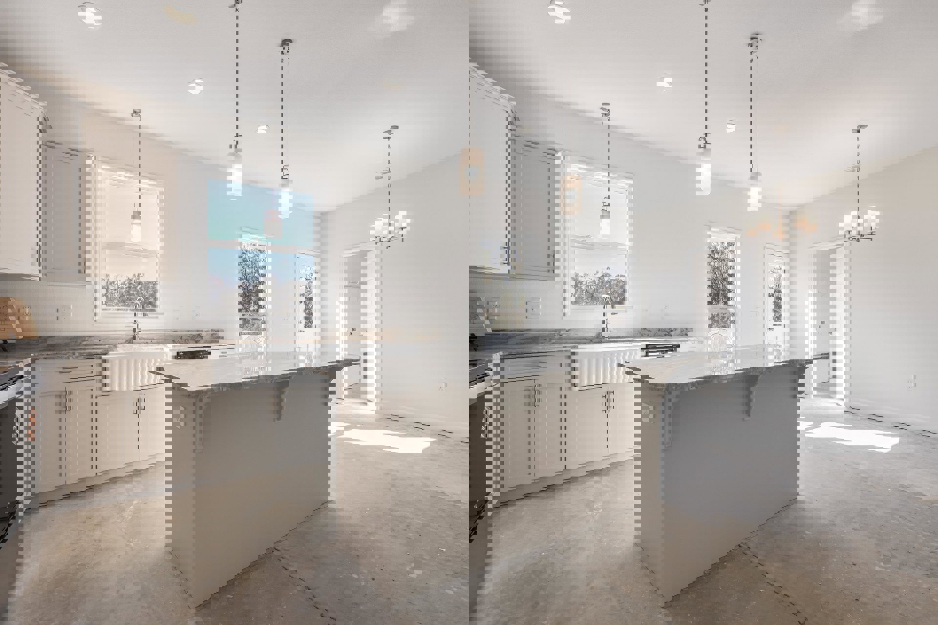 Modern kitchen featuring a white island with built-in sink and chrome faucet, tile backsplash, light cabinetry, stainless steel appliances, and large window providing natural