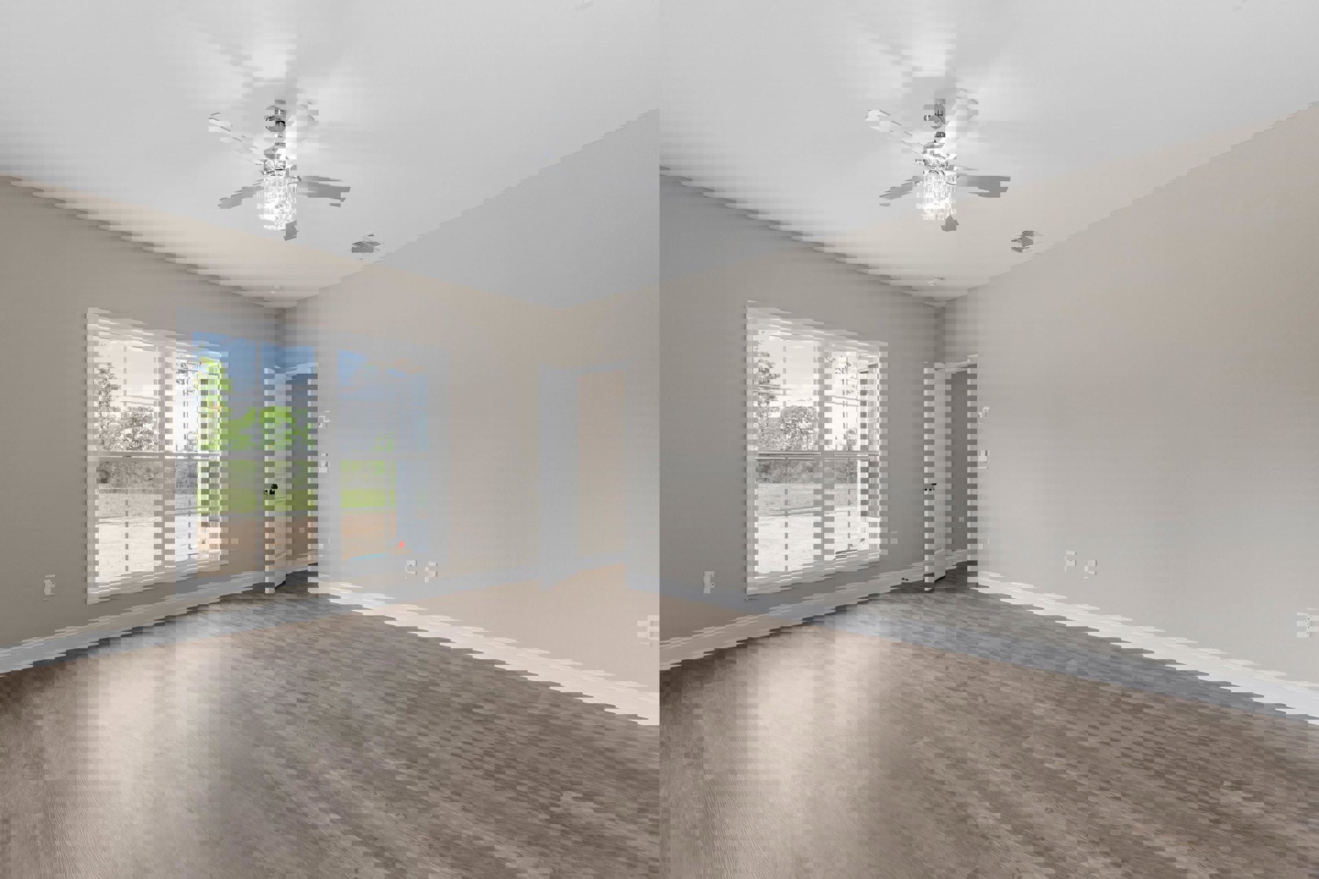 Wood floor room featuring a ceiling fan with crystal light fixture, white door with black knobs, and window overlooking yard