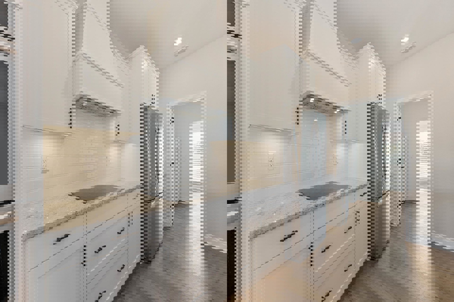 White shaker cabinets, stainless steel refrigerator, light tile backsplash, quartz countertops, and dark flooring in a modern kitchen.