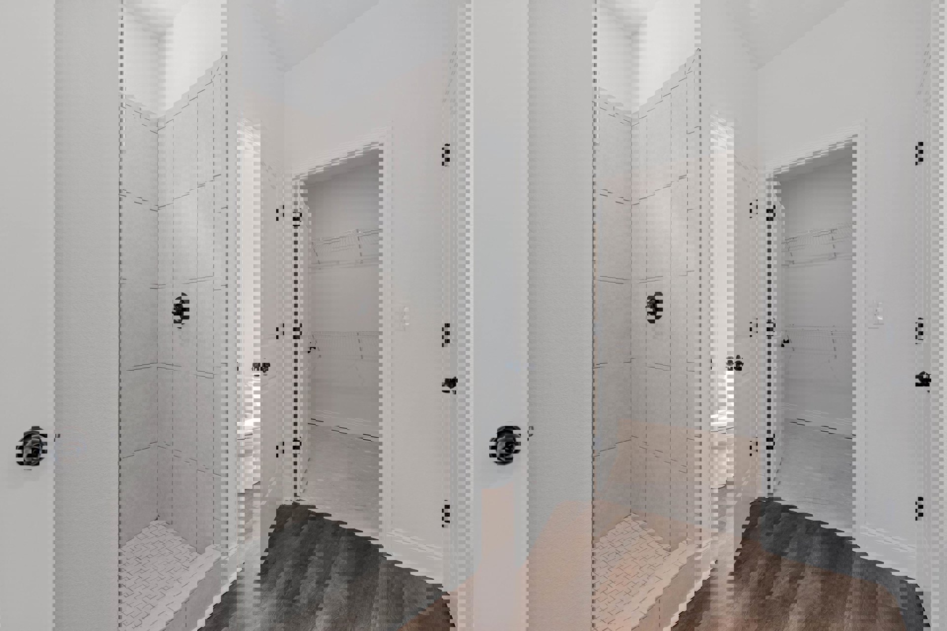 Modern bathroom with white tile floor featuring black grout lines, glass-enclosed shower, wall-mounted toilet, and plaster walls; close-up details include a black screw in the wall