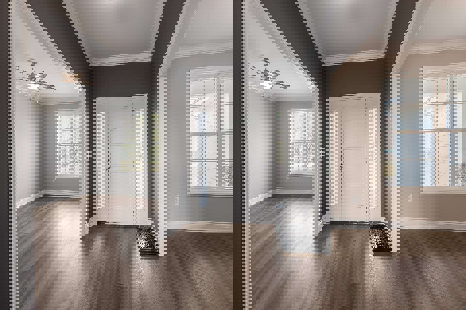 White paneled door with silver handle, multi-pane window, black metal doormat, hardwood floor, white plaster walls