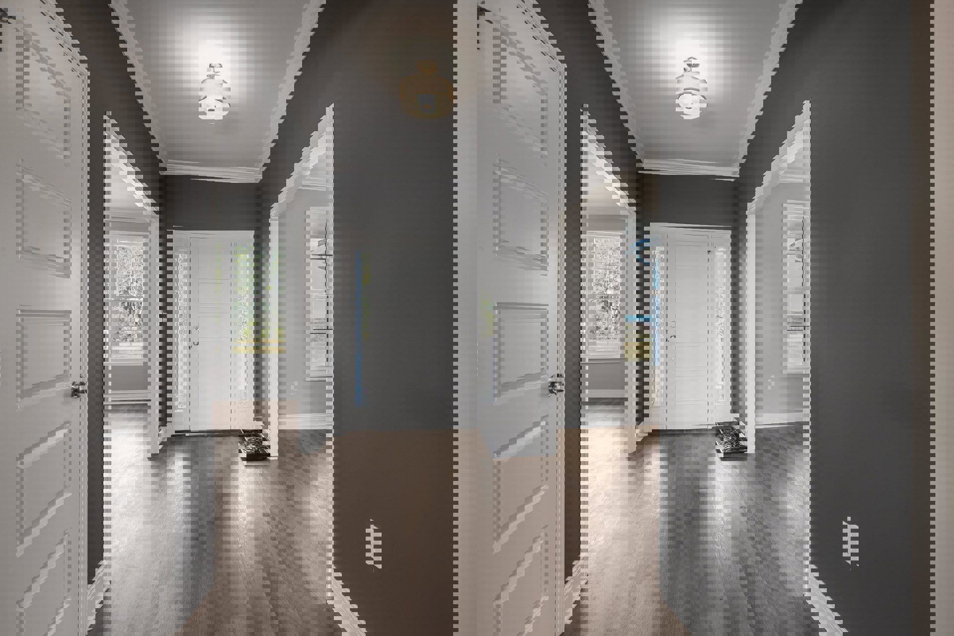 Hallway with light wood flooring, white paneled doors with silver handles, white walls, a white glass-paneled door, and a ceiling light fixture with a white shade