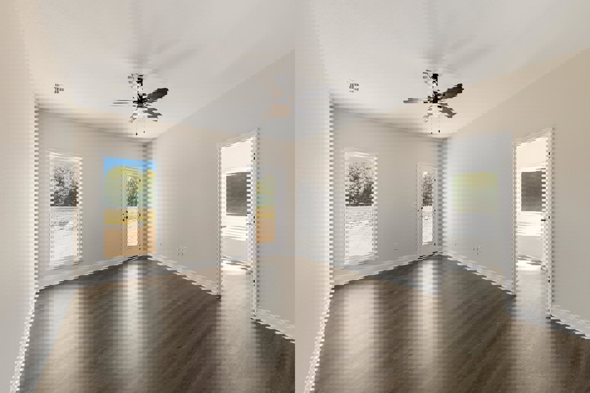 Ceiling fan with light fixture, wood flooring, large windows showing trees and grassy field, glass-paneled door, white plaster walls