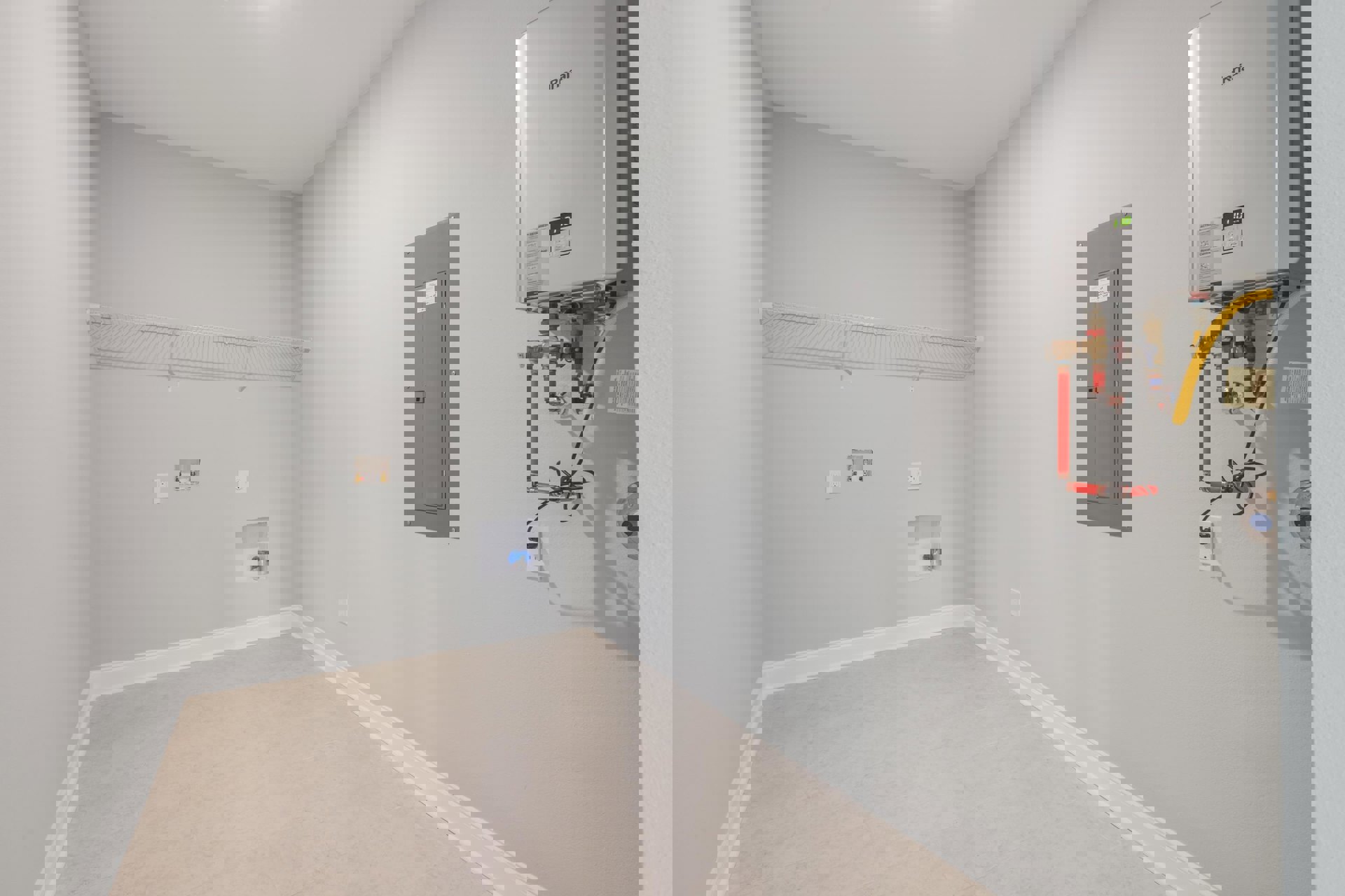 White tile floor with matching trim, white plaster walls, grey metal door featuring a square window, wire rack shelving, and a white rectangular thermostat with buttons and digital