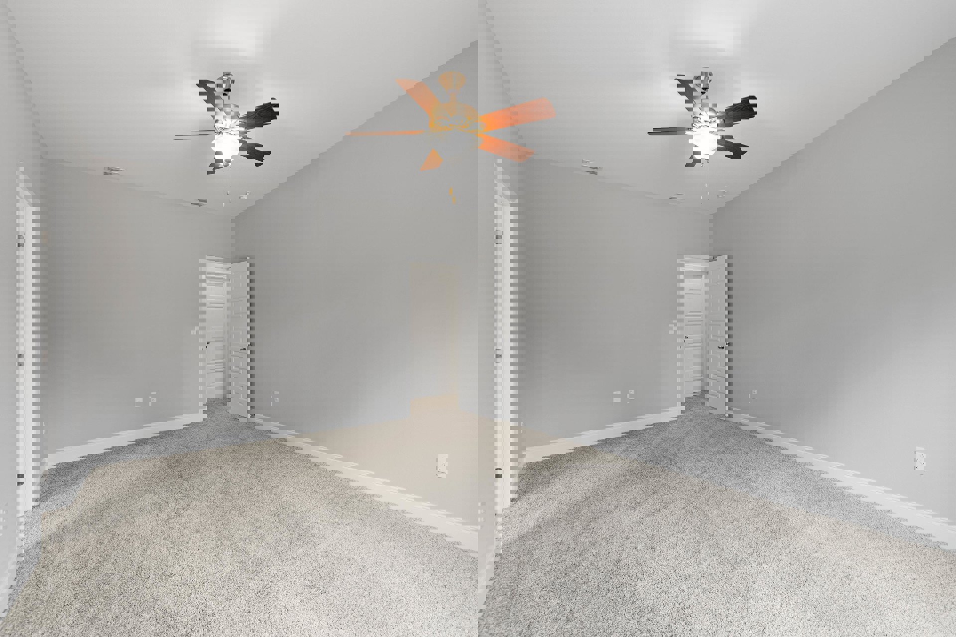 Carpeted room with white walls, ceiling fan with light fixture, white door featuring silver knob, simple baseboard molding