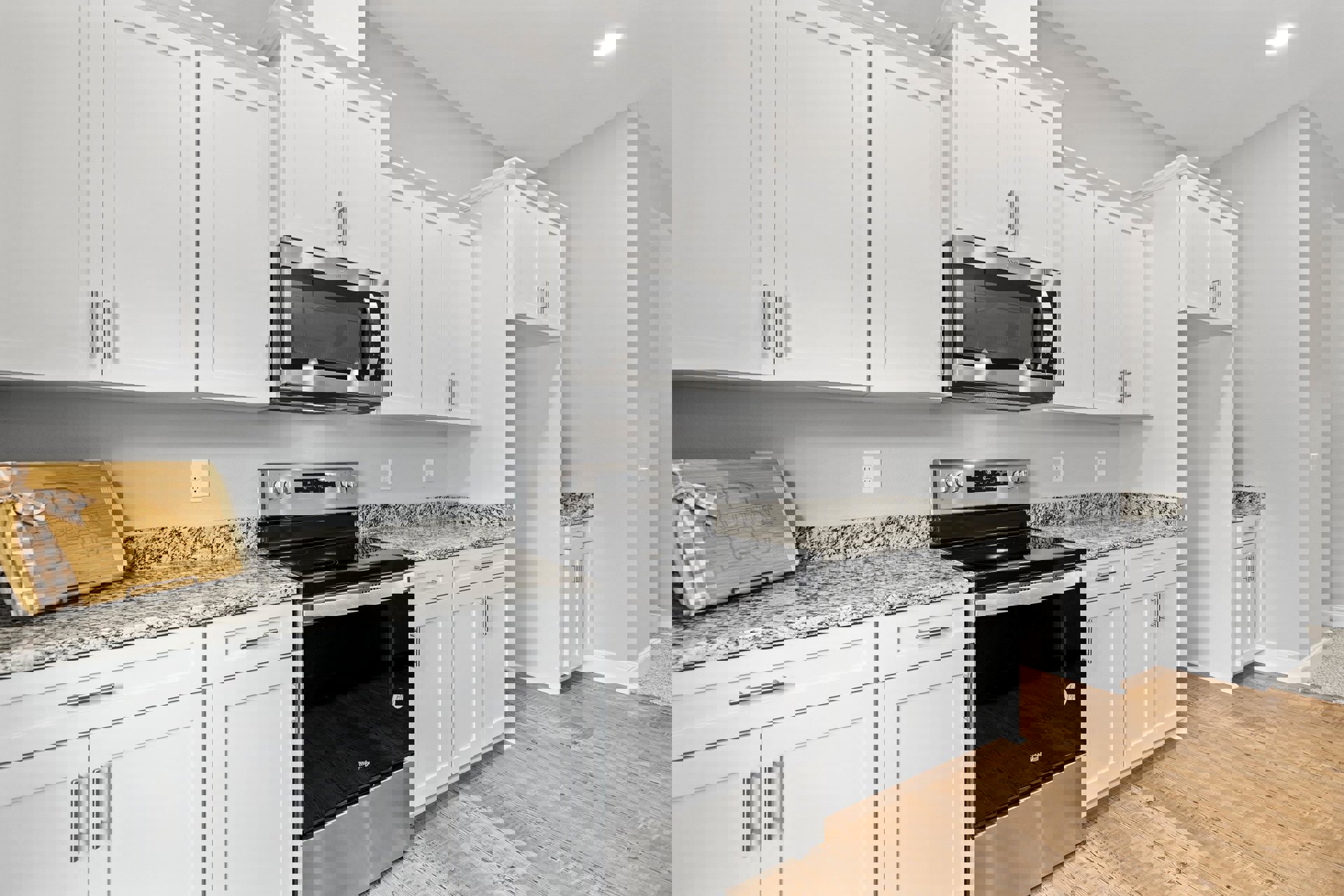 White kitchen cabinets, black stove and oven, microwave above stove, checkered cloth and bow on wooden cutting board, bright overhead lighting, white door with black frame